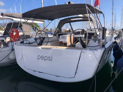 Exterior view of Pepsi, a Dufour 430 GL sailboat at Tonnarella, Italy