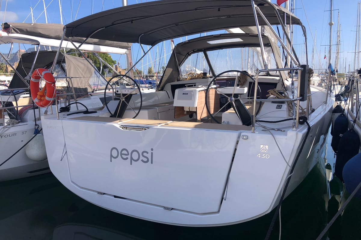 Exterior view of Pepsi, a Dufour 430 GL sailboat at Tonnarella, Italy