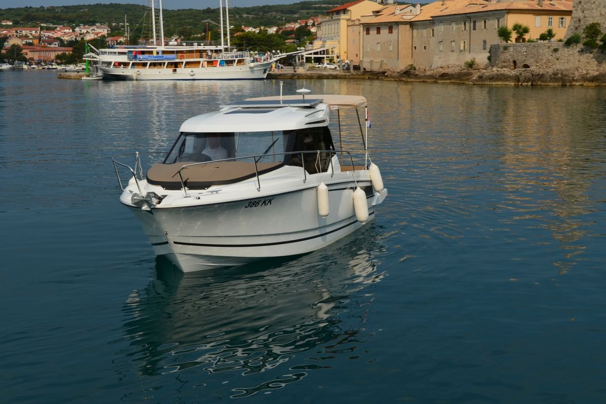 Exterior view of MF 795, a Jeanneau Merry Fisher 795 motorboat at Punat, Croatia