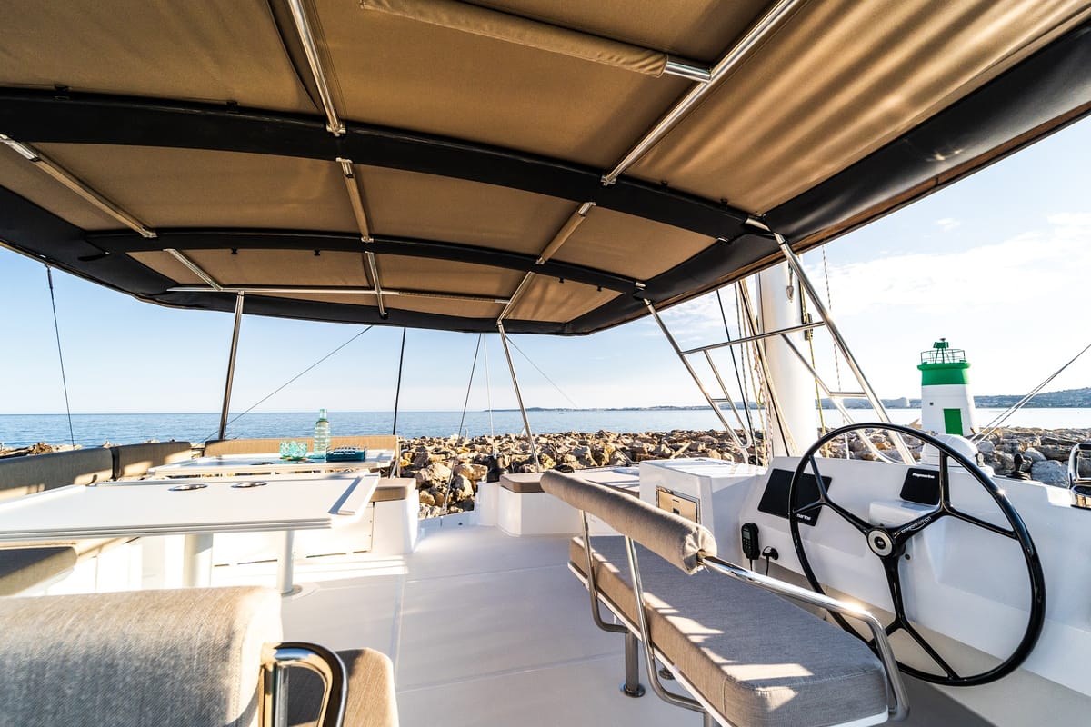 Cockpit of Signature Vision (2022), a Bali 5.4 catamaran at Olbia, Italy