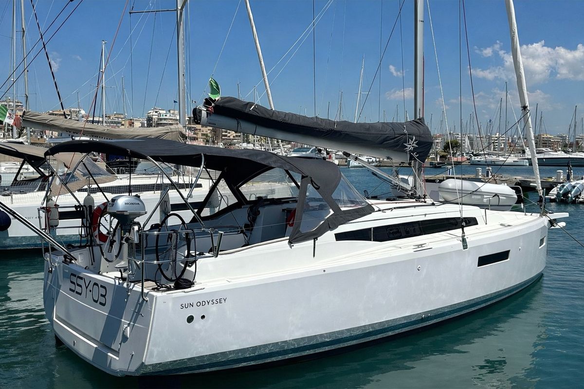 Exterior view of SSY-03, a Jeanneau Sun Odyssey 380 sailboat at Nettuno, Italy
