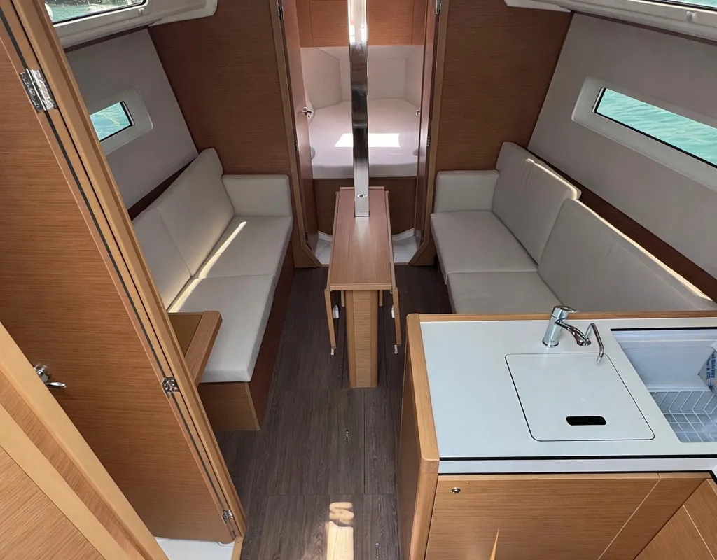 Salon of SSY-03, a Jeanneau Sun Odyssey 380 sailboat at Nettuno, Italy