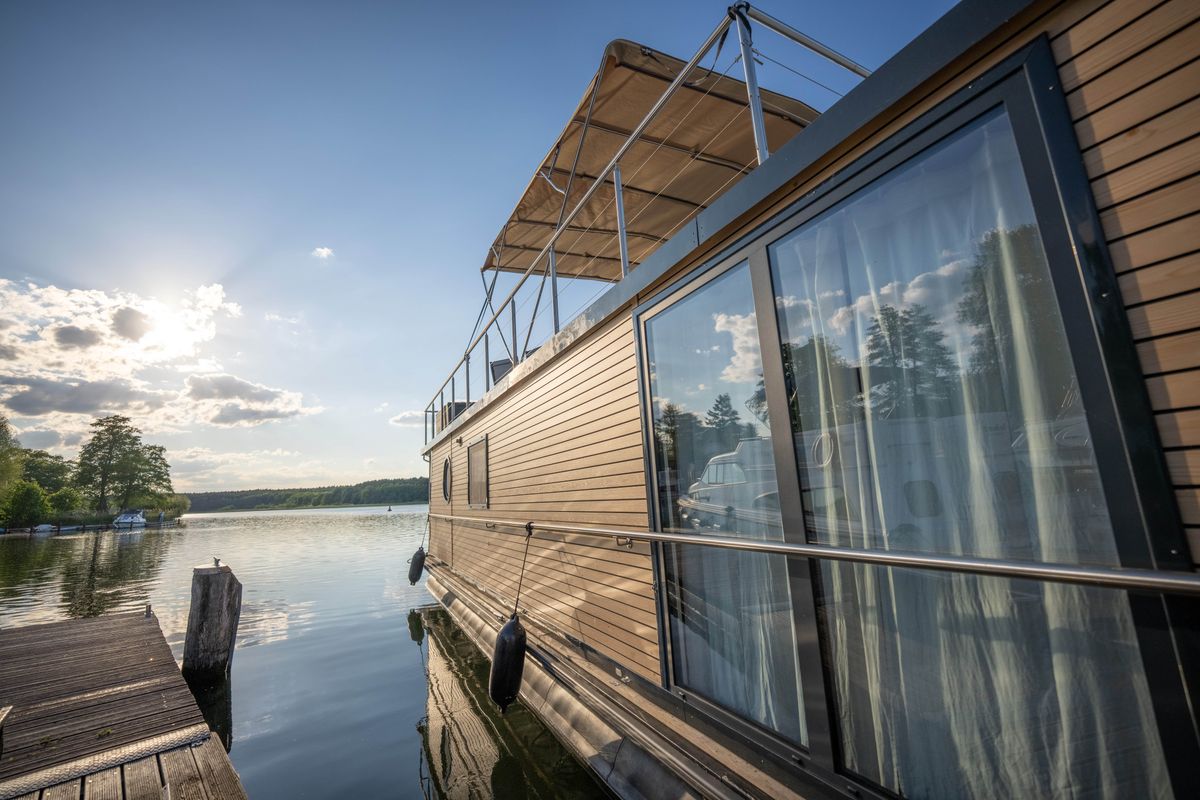 Exterior view of Emsel, a Woma D13 motorboat at Fürstenberg/Havel, Germany