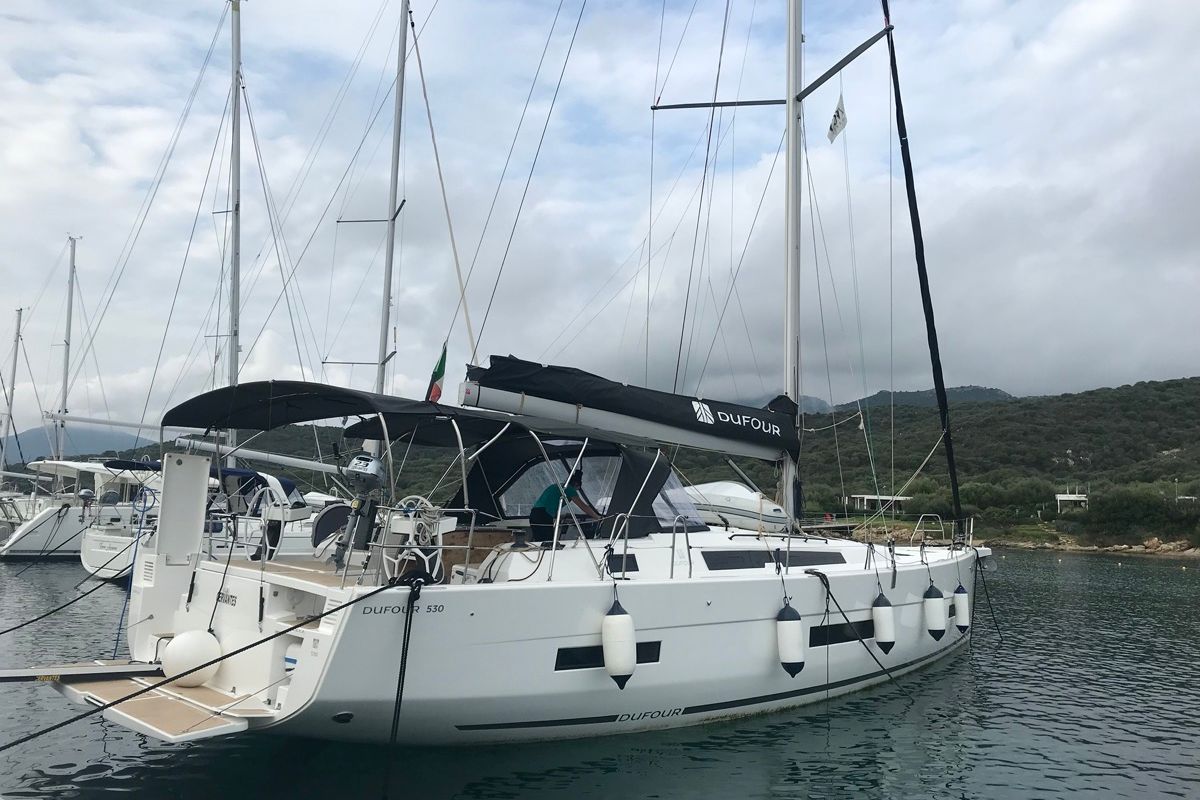 Exterior view of Cervantes, a Dufour 530 sailboat at Olbia, Italy