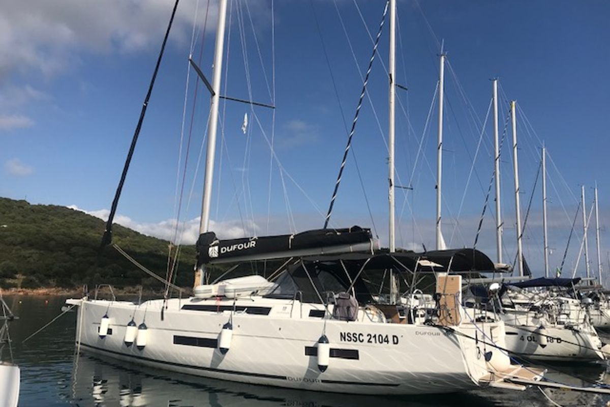Exterior view of Cervantes, a Dufour 530 sailboat at Olbia, Italy