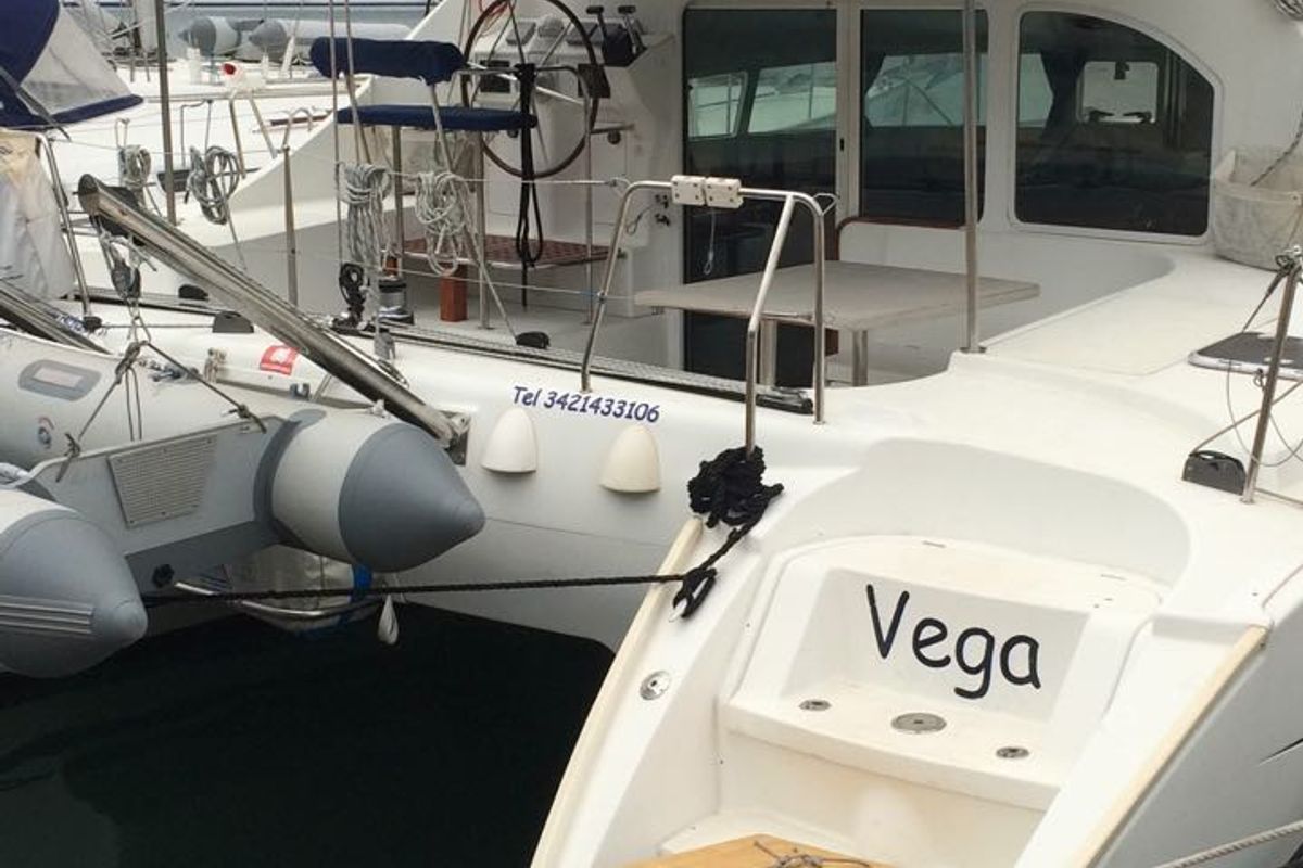 Exterior view of Vega, a Lagoon 410 S2 catamaran at Cagliari, Italy
