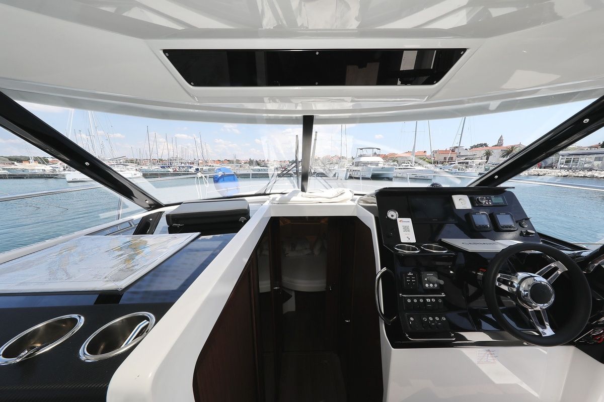 Cockpit of Raptor, a Jeanneau Merry Fisher 1095 Fly motorboat at Grad Biograd na Moru, Croatia