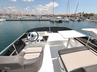 Cockpit of Raptor, a Jeanneau Merry Fisher 1095 Fly motorboat at Grad Biograd na Moru, Croatia