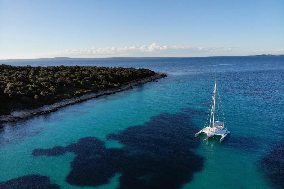 Exterior view of Don Cangrejo, a Gulet Trimaran sailboat at Duino Aurisina / Devin - Nabrežina, Italy