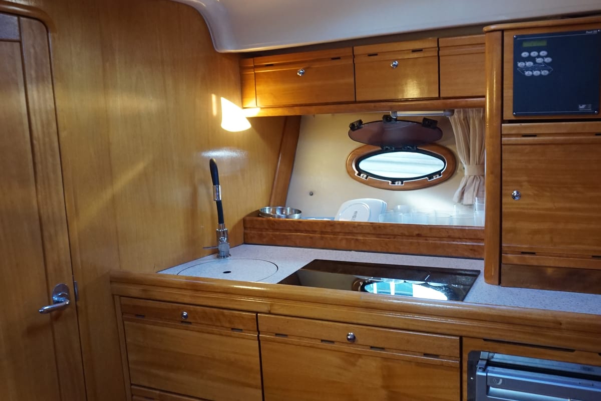 Exterior view of Barlovento Segundo, a Bavaria Sport 35 motorboat at Palma de Mallorca, Spain