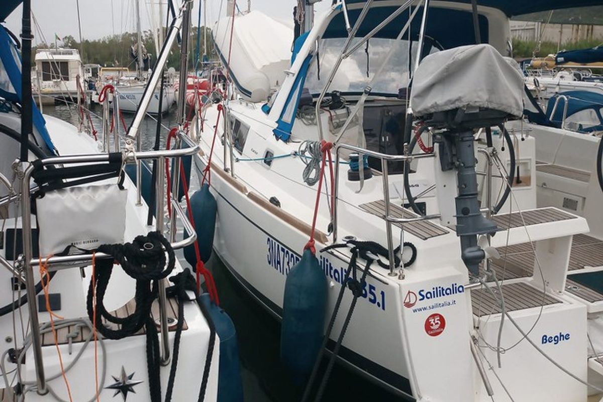 Exterior view of Beghe, a Beneteau Oceanis 35.1 sailboat at Cannigione, Italy