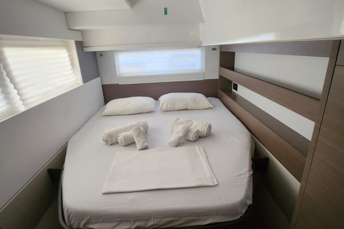Head on Beghe, a Beneteau Oceanis 35.1 sailboat at Cannigione, Italy