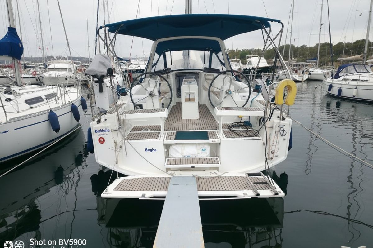 Exterior view of Beghe, a Beneteau Oceanis 35.1 sailboat at Cannigione, Italy