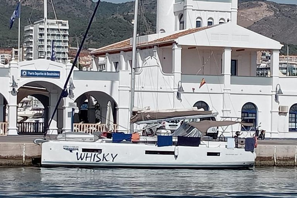 Exterior view of Alboran Whisky, a Jeanneau Sun Odyssey 440 sailboat at es Jonquet, Spain