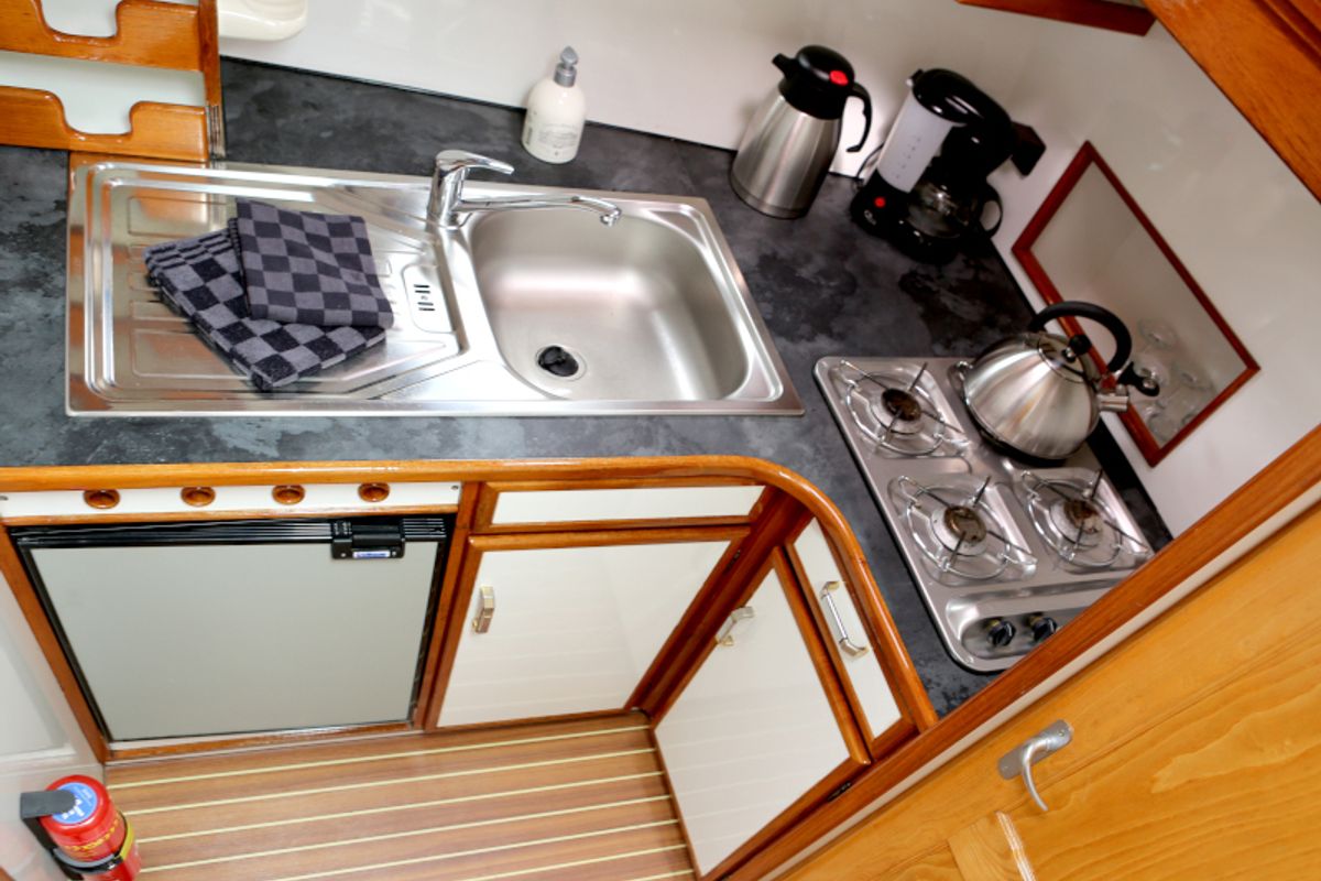 Galley of Callisto, a Pedro Solano 33 motorboat at Heukelum, Netherlands