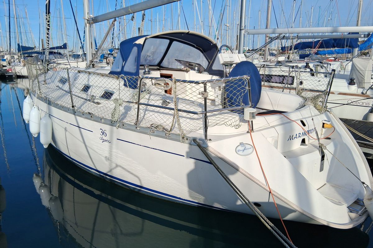 Exterior view of Marmotton, a Dufour 36 Classic sailboat at La Rochelle, France