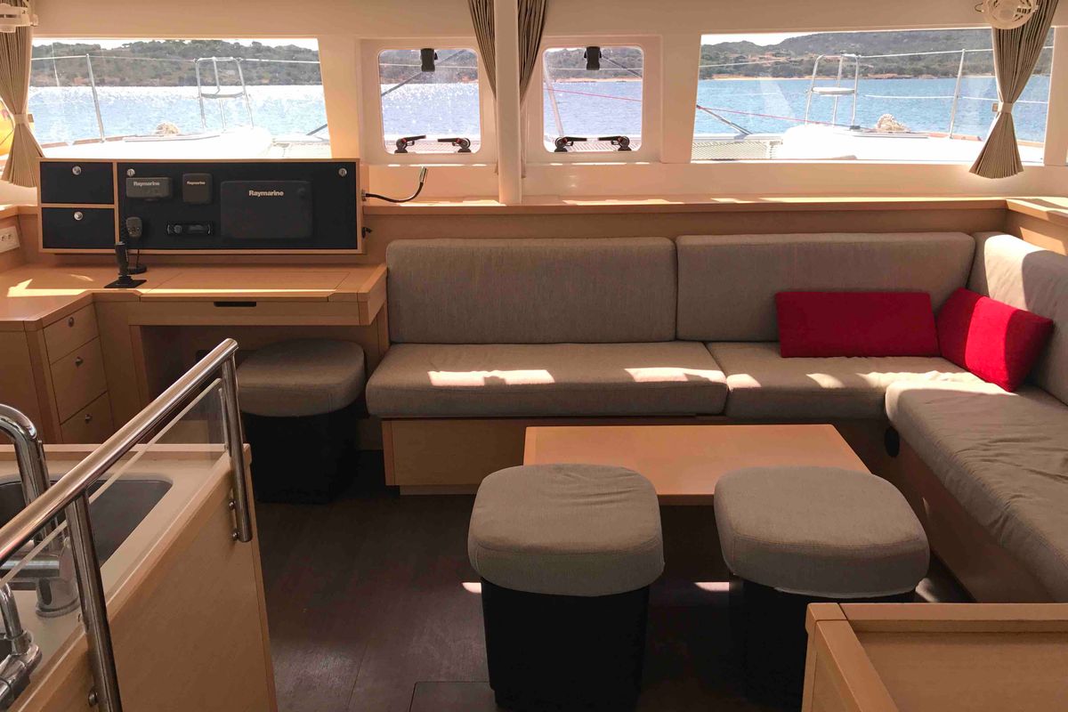 Salon of Dugongo, a Lagoon 450 Fly catamaran at Olbia, Italy