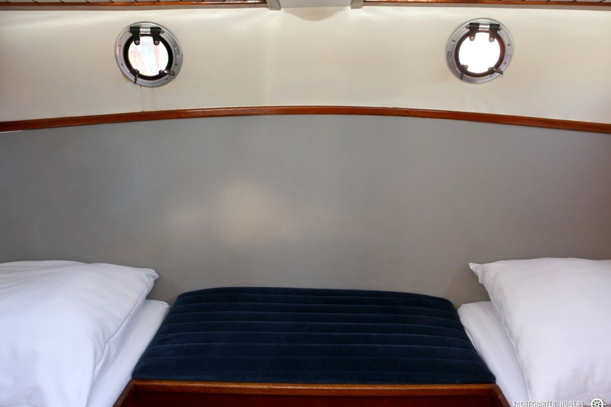 Cabin on Haedi, a Courtevenne 830 motorboat at Heukelum, Netherlands