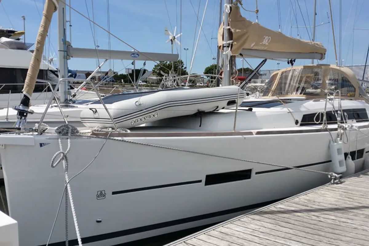 Exterior view of Excalibur, a Dufour 382 Grand Large sailboat at Port Navalo, France