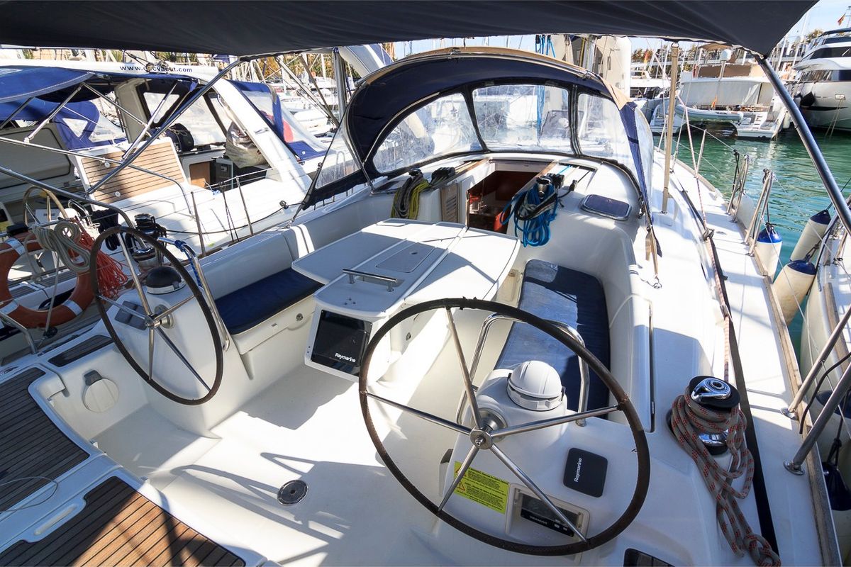 Cockpit of Demonio de Tasmania, a Beneteau Oceanis 43 sailboat at es Jonquet, Spain