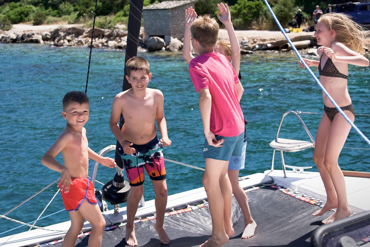 Deck of Jumping Fitness, a Aventura Catamarans Aventura 34 catamaran at Grad Šibenik, Croatia