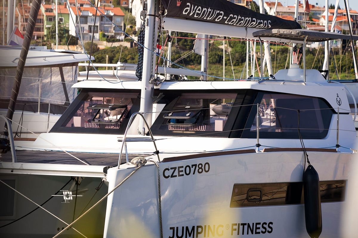Exterior view of Jumping Fitness, a Aventura Catamarans Aventura 34 catamaran at Grad Šibenik, Croatia