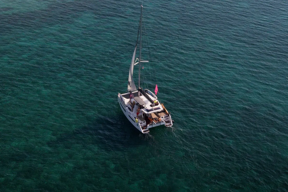 Exterior view of Jumping Fitness, a Aventura Catamarans Aventura 34 catamaran at Grad Šibenik, Croatia