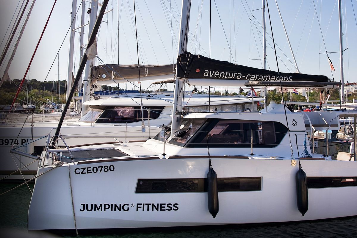 Exterior view of Jumping Fitness, a Aventura Catamarans Aventura 34 catamaran at Grad Šibenik, Croatia