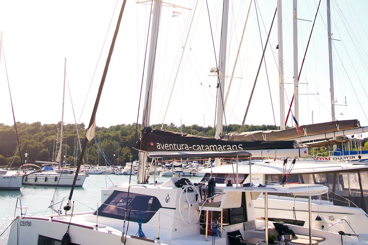 Exterior view of Jumping Fitness, a Aventura Catamarans Aventura 34 catamaran at Grad Šibenik, Croatia