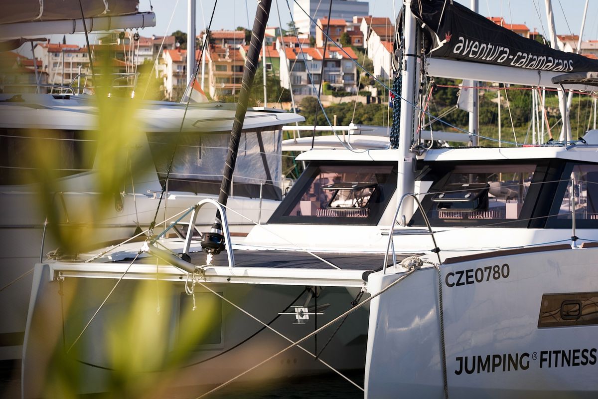 Exterior view of Jumping Fitness, a Aventura Catamarans Aventura 34 catamaran at Grad Šibenik, Croatia