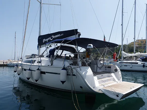 Exterior view of Ti Tengo D'okkio, a Bavaria Cruiser 46 sailboat at Procida, Italy