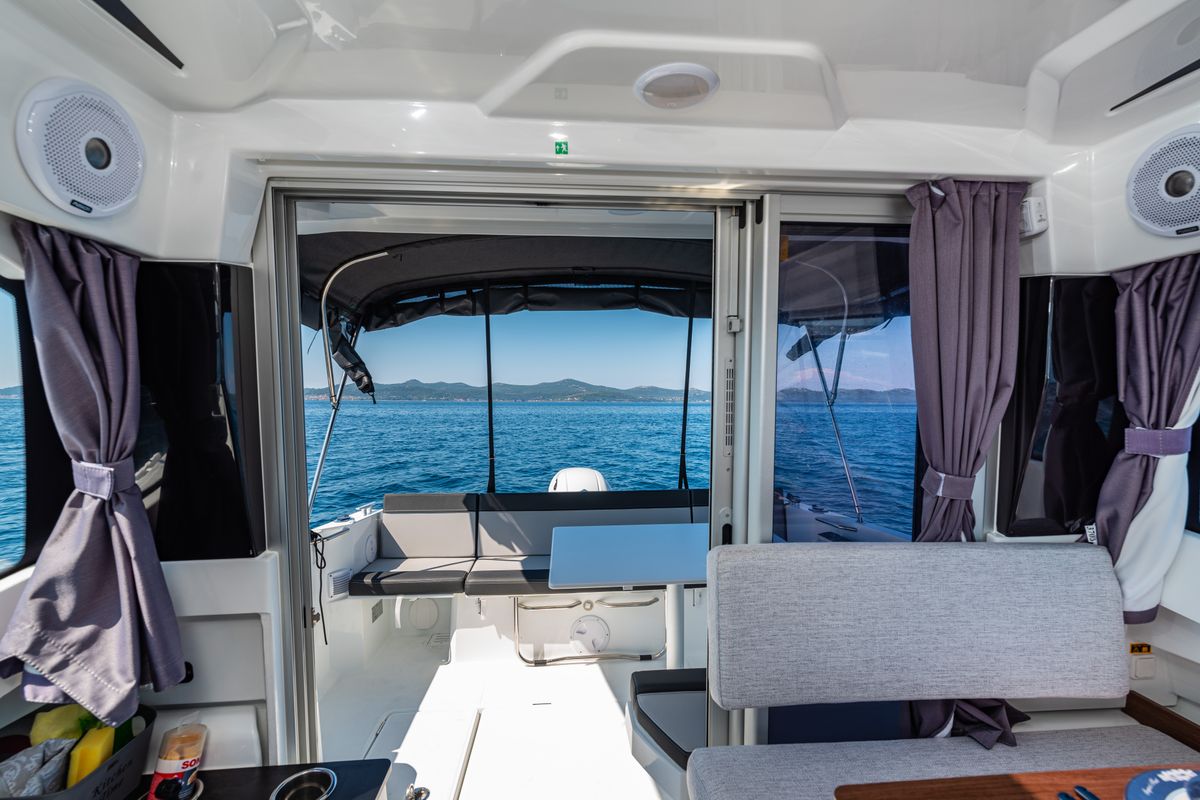 Salon of Klapa, a Jeanneau Merry Fisher 795 motorboat at Municipality of Novigrad, Croatia