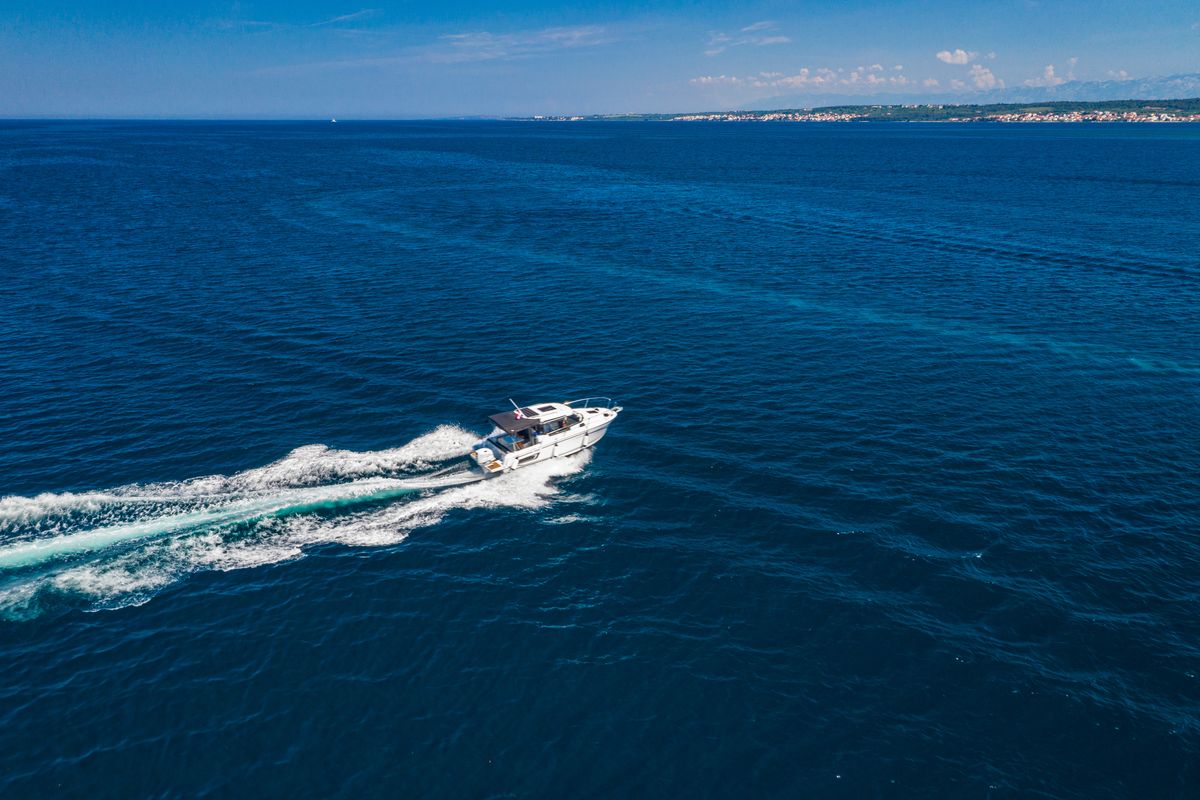 Exterior view of Klapa, a Jeanneau Merry Fisher 795 motorboat at Municipality of Novigrad, Croatia