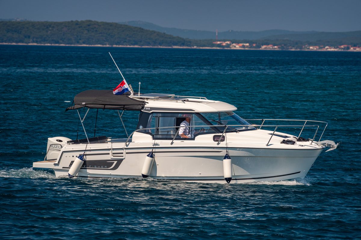 Exterior view of Klapa, a Jeanneau Merry Fisher 795 motorboat at Municipality of Novigrad, Croatia