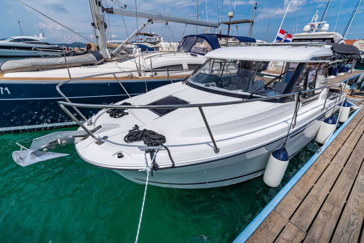 Exterior view of Klapa, a Jeanneau Merry Fisher 795 motorboat at Municipality of Novigrad, Croatia