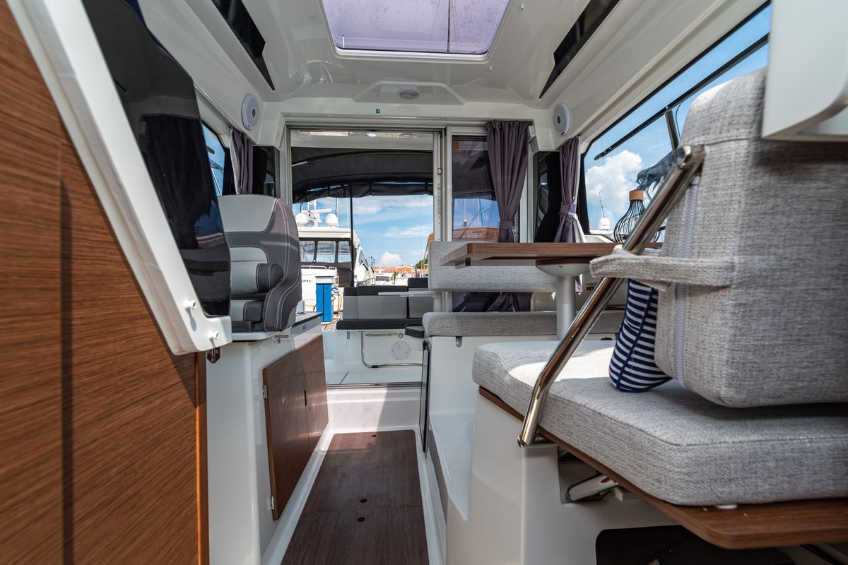 Salon of Klapa, a Jeanneau Merry Fisher 795 motorboat at Municipality of Novigrad, Croatia