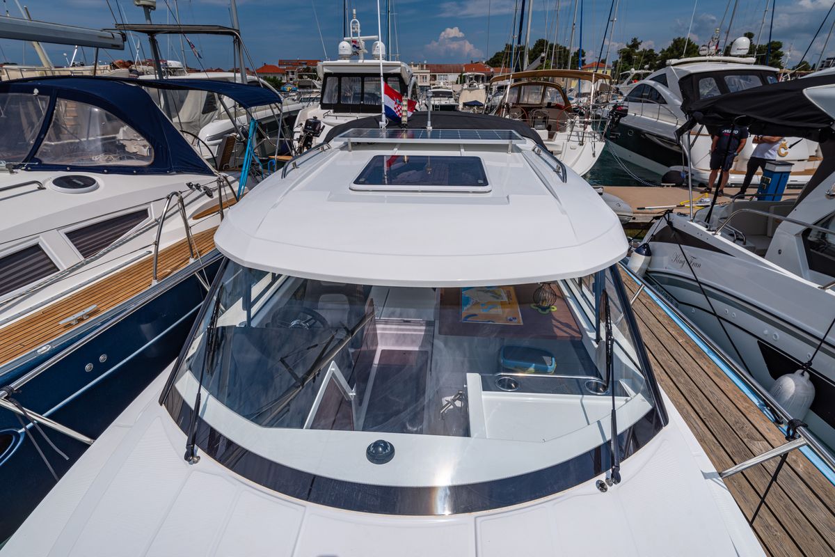 Exterior view of Klapa, a Jeanneau Merry Fisher 795 motorboat at Municipality of Novigrad, Croatia