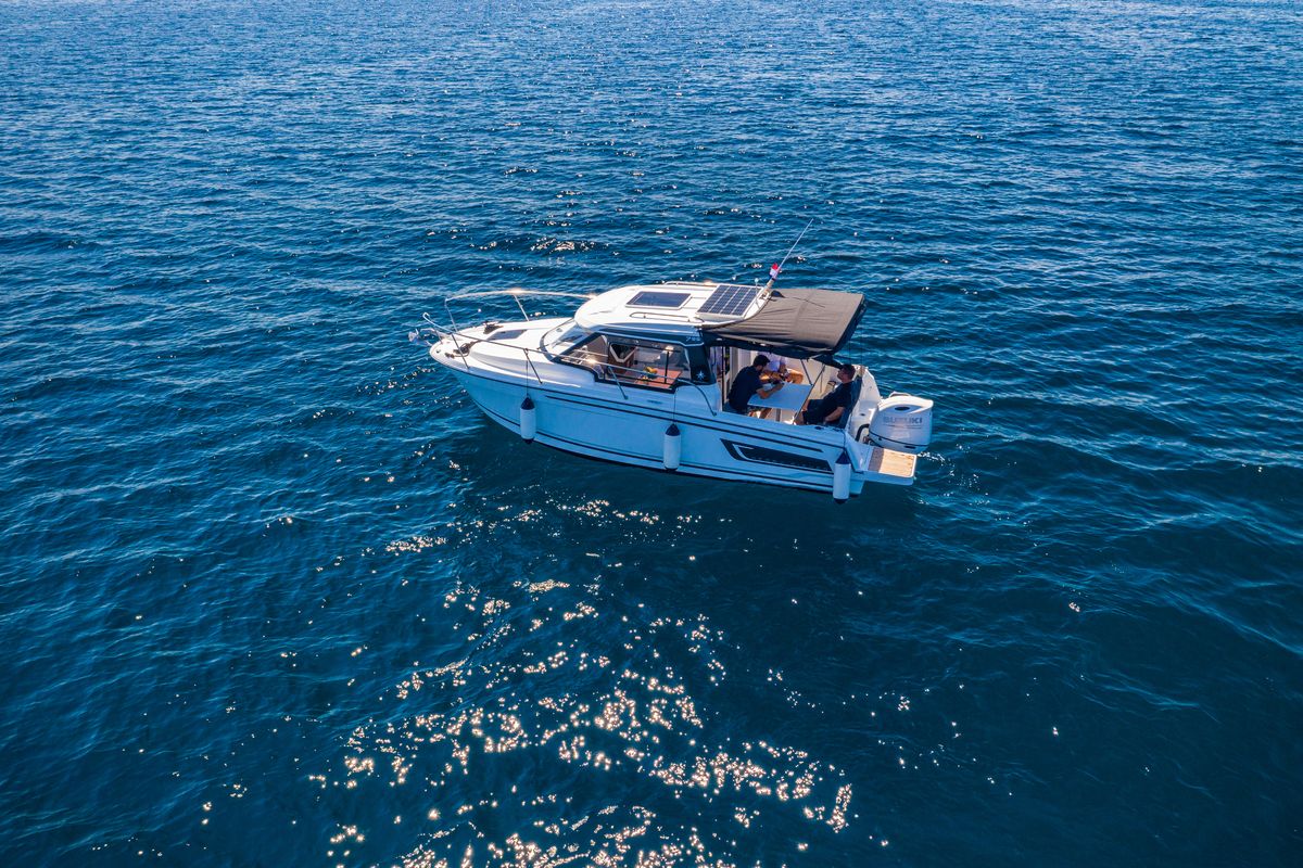 Exterior view of Klapa, a Jeanneau Merry Fisher 795 motorboat at Municipality of Novigrad, Croatia