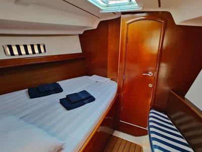 Cabin on Crete, a Beneteau Oceanis Clipper 393 sailboat at Athens, Marina Delta Kallithea, Greece