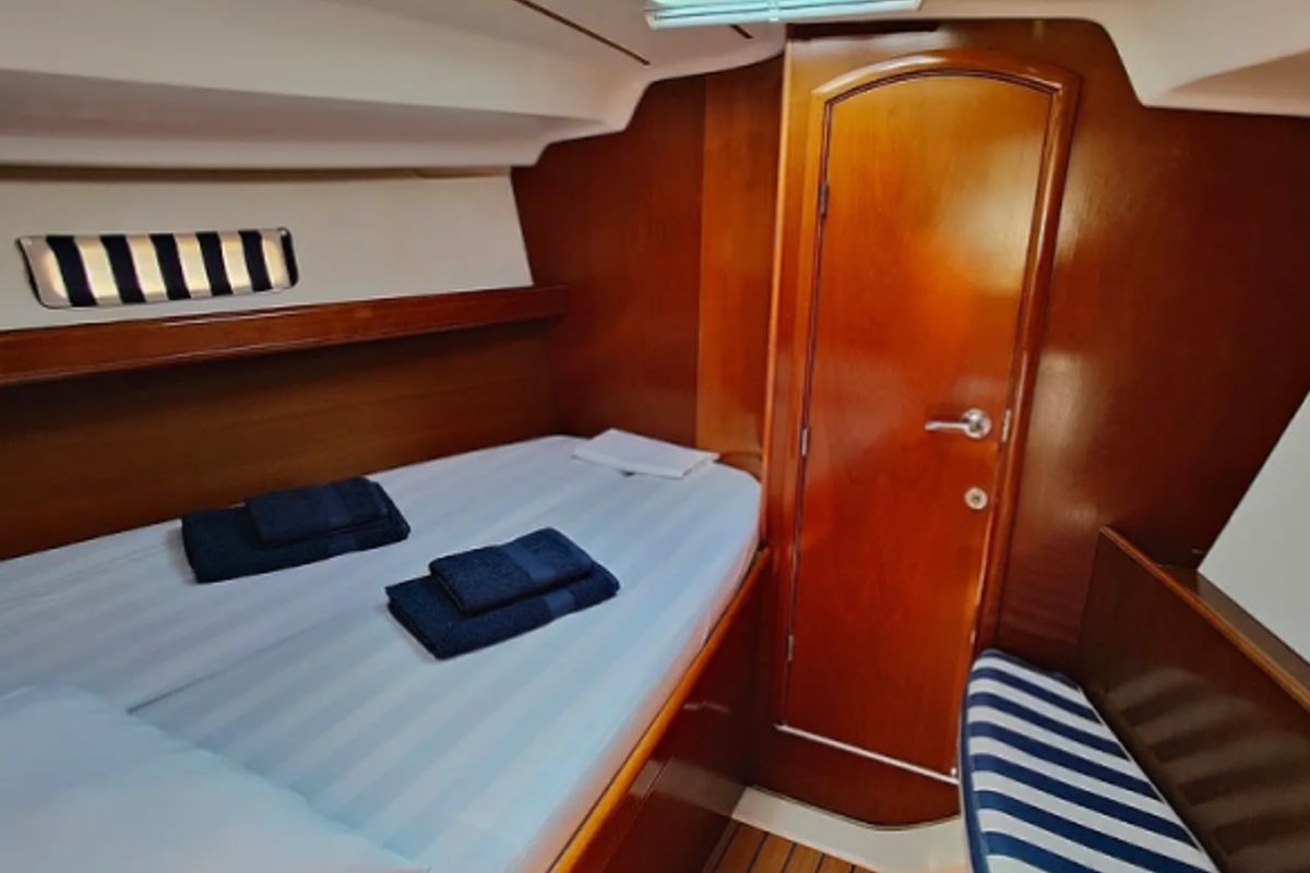 Cabin on Crete, a Beneteau Oceanis Clipper 393 sailboat at Athens, Marina Delta Kallithea, Greece