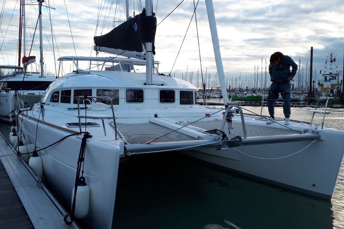 Exterior view of Butterfly, a Lagoon 380 catamaran at Parikia, Greece