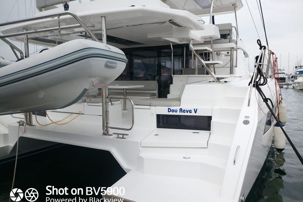Exterior view of Dou Reve V, a Leopard 45 catamaran at Cannigione, Italy