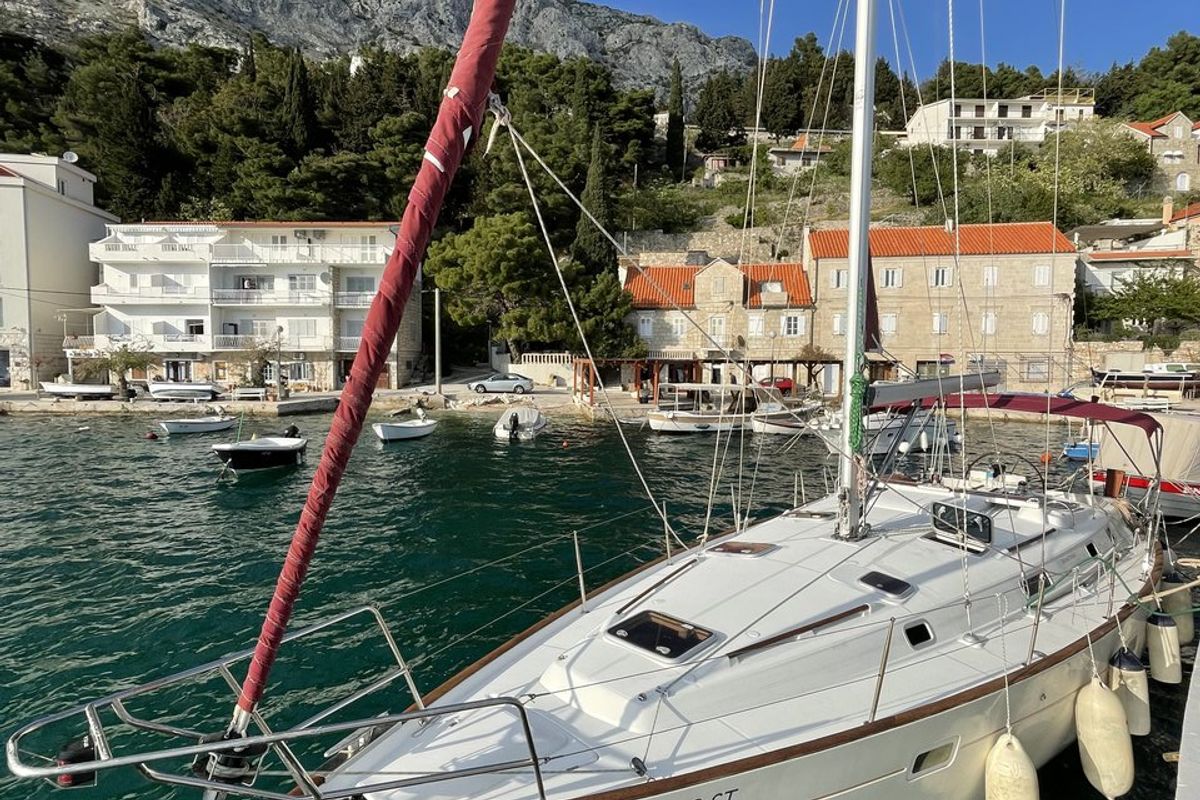 Exterior view of M&M, a Beneteau Oceanis 411 Celebration sailboat at Grad Omiš, Croatia