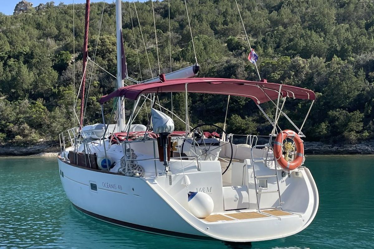 Exterior view of M&M, a Beneteau Oceanis 411 Celebration sailboat at Grad Omiš, Croatia