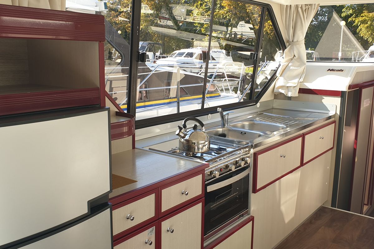Galley of Harlingen, a Nicols Sedan 1160 motorboat at Lübz, Germany