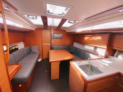 Salon of Les Copains D'abord, a Dufour 390 GL sailboat at Marseille, France