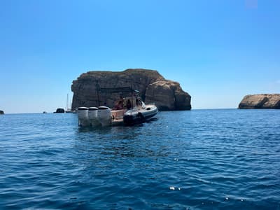 Exterior view of Ethan Jo, a Nuova Jolly Prince 38 Sport Cabin motorboat at Msida, Malta