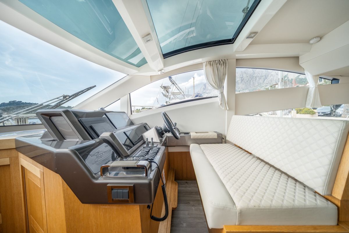 Exterior view of BELLAGIO, a Galeon 430 Skydeck motorboat at Makarska, Croatia