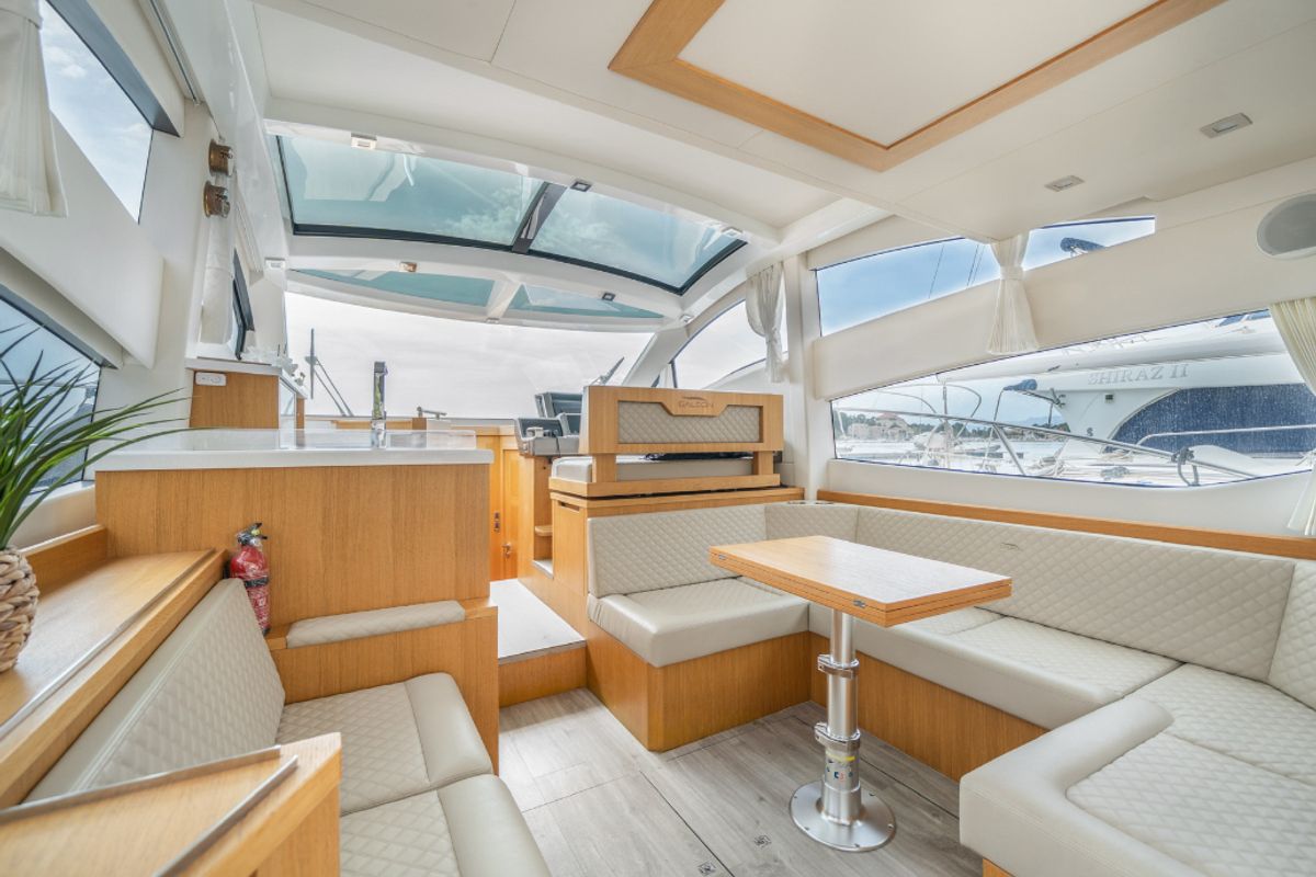 Exterior view of BELLAGIO, a Galeon 430 Skydeck motorboat at Makarska, Croatia