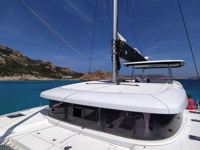 Deck of Mare, a Lagoon 42 catamaran at Lu Palau/Palau, Italy